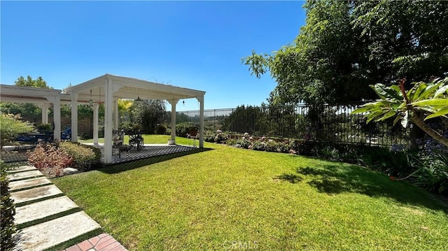 view of yard featuring a patio and fence