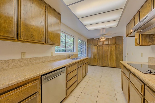 kitchen with sink, black electric stovetop, stainless steel dishwasher, light stone counters, and ceiling fan