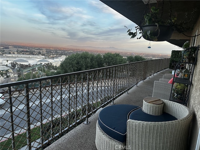 view of balcony at dusk