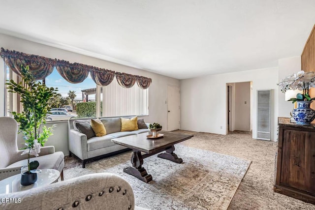 living room with light colored carpet