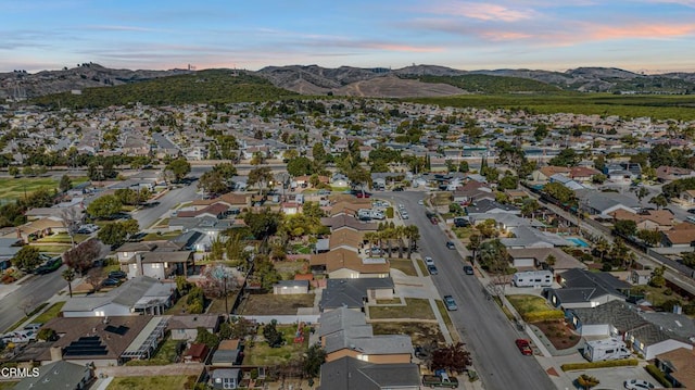 aerial view at dusk with a mountain view