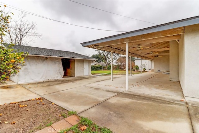 exterior space featuring a carport