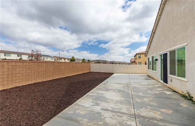 view of yard with a patio area