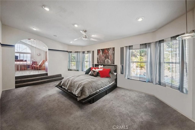 bedroom featuring multiple windows and carpet floors