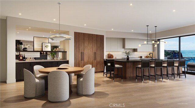 23502 Seaward Isle, Dana Point, CA 92629 - dining area with light wood finished floors and recessed lighting