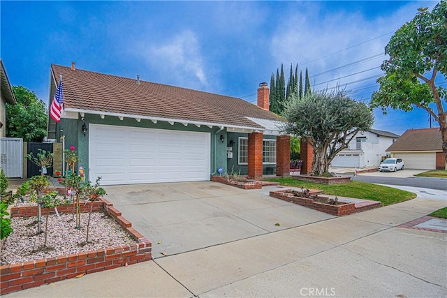 single story home featuring a garage