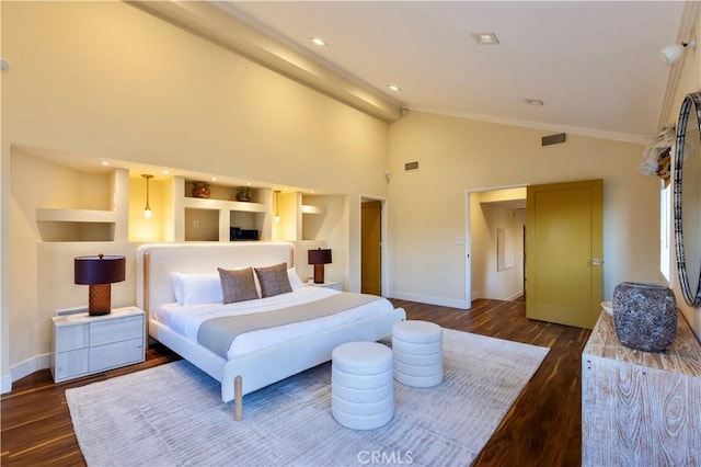 bedroom featuring high vaulted ceiling and dark hardwood / wood-style floors