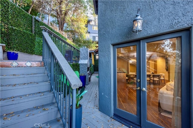 wooden deck featuring french doors