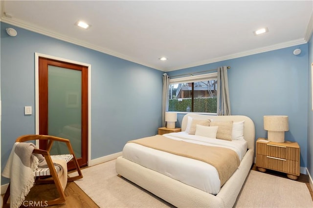 bedroom featuring hardwood / wood-style flooring and ornamental molding