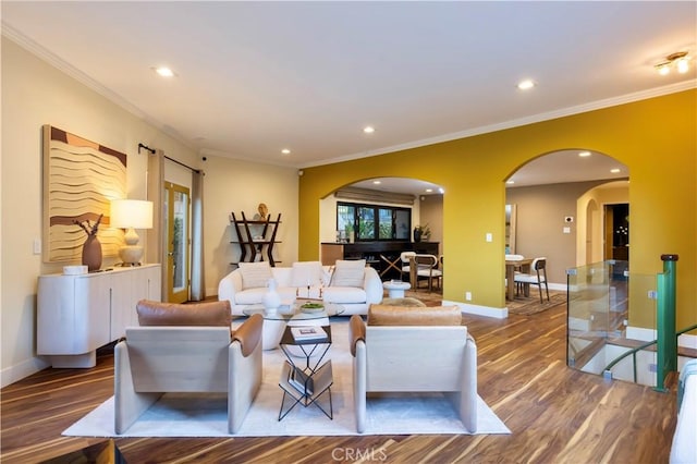 living room featuring crown molding and wood-type flooring