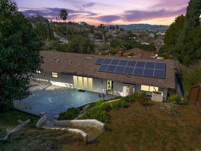 view of aerial view at dusk