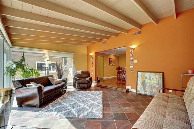 tiled living room with wooden ceiling and beamed ceiling