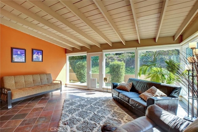 sunroom / solarium with vaulted ceiling with beams