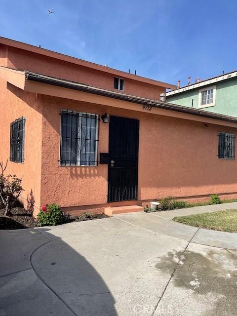 property entrance with a patio