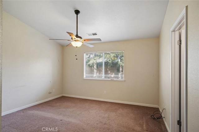 unfurnished bedroom featuring vaulted ceiling, carpet floors, and ceiling fan