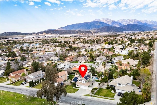 drone / aerial view with a residential view and a mountain view