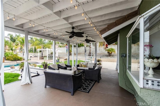 view of patio / terrace with ceiling fan, an outdoor pool, and an outdoor living space