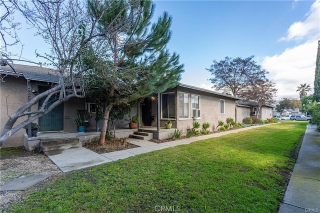 view of front of home featuring a front lawn