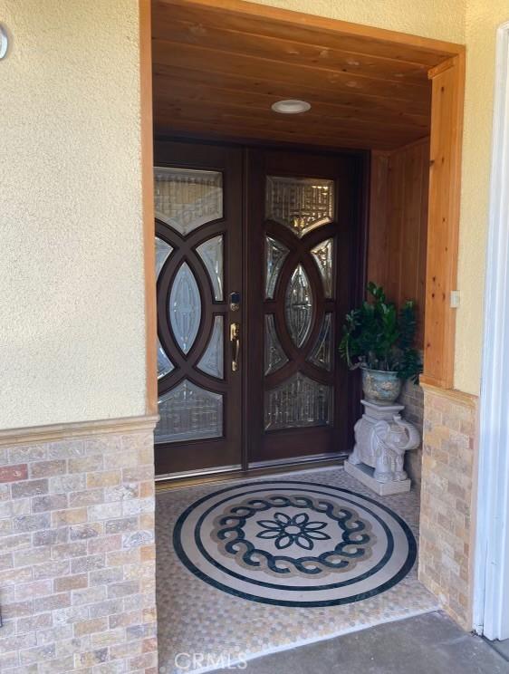 doorway to property with french doors