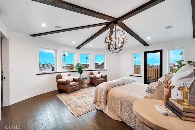 bedroom featuring beamed ceiling, dark hardwood / wood-style flooring, and a chandelier