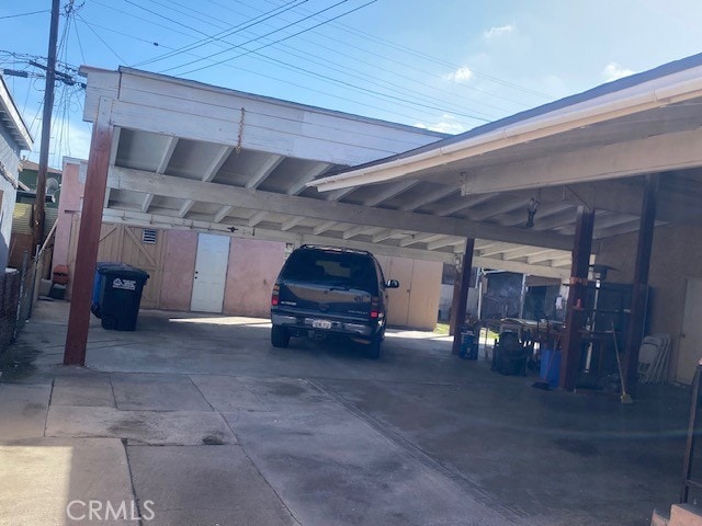 view of car parking featuring a carport