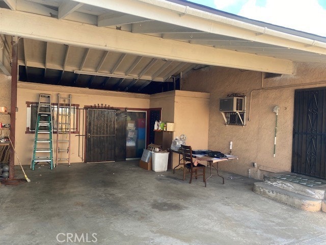 garage with a wall unit AC