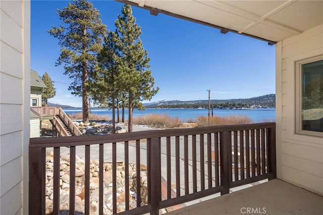 balcony featuring a water view