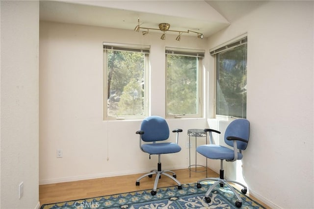sitting room featuring wood finished floors and baseboards