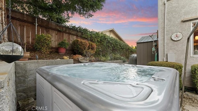 exterior space featuring a hot tub