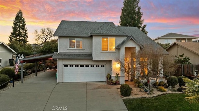 view of front of property with a garage