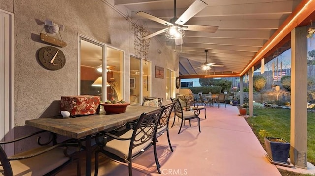 view of patio featuring ceiling fan