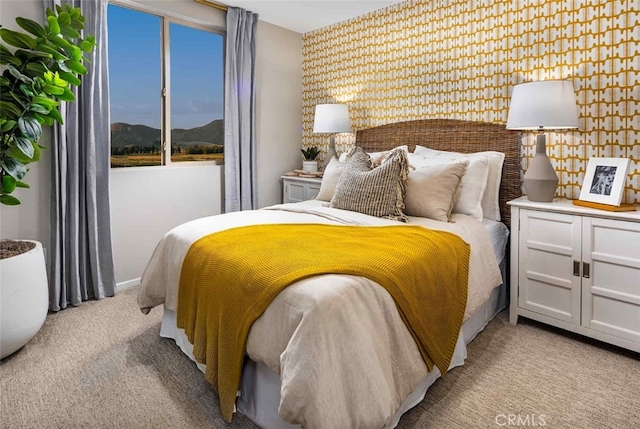 bedroom with light colored carpet