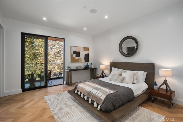 bedroom featuring access to exterior and light parquet floors