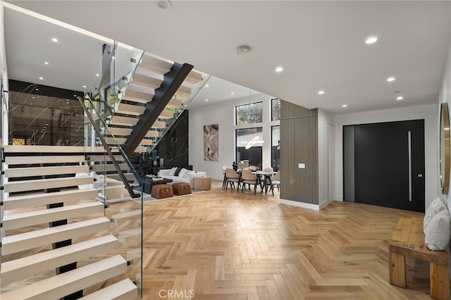 entryway featuring light parquet floors