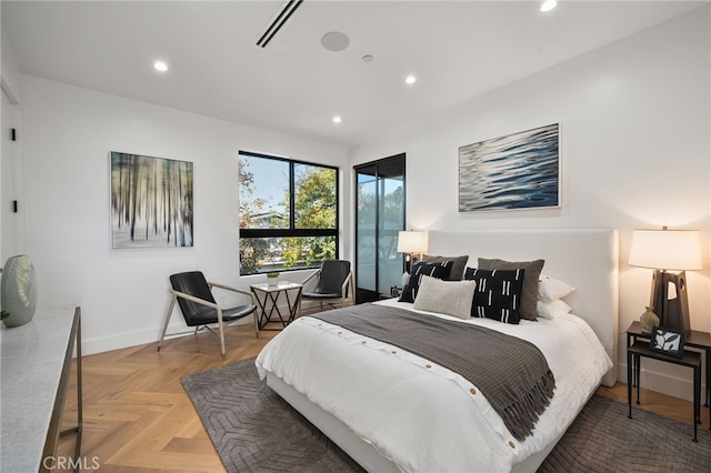 bedroom featuring parquet flooring