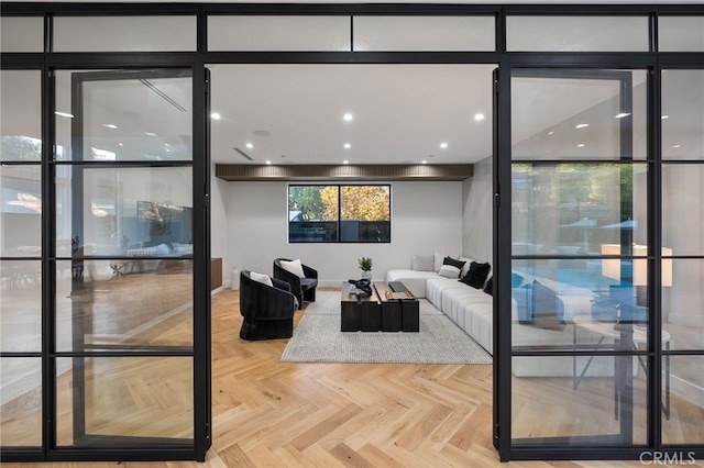 living room featuring parquet flooring