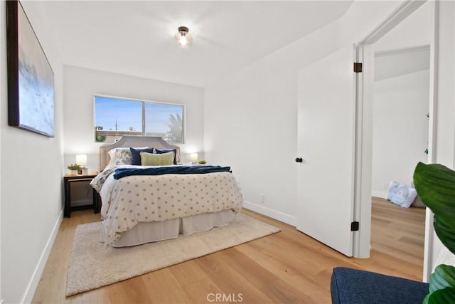 bedroom featuring light hardwood / wood-style floors