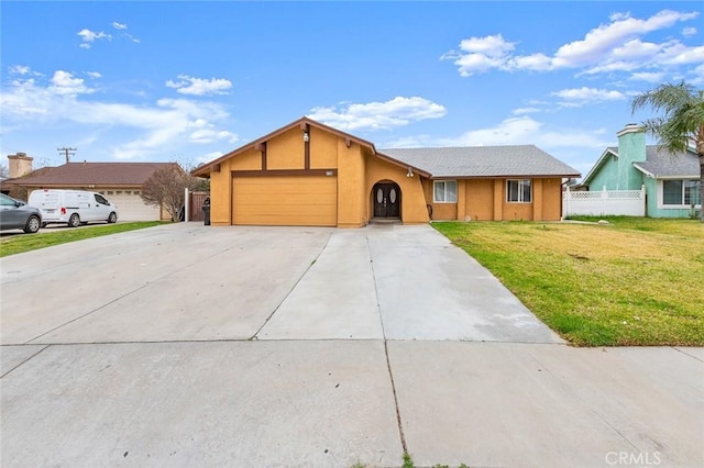 ranch-style house featuring stucco siding, fence, a garage, driveway, and a front lawn