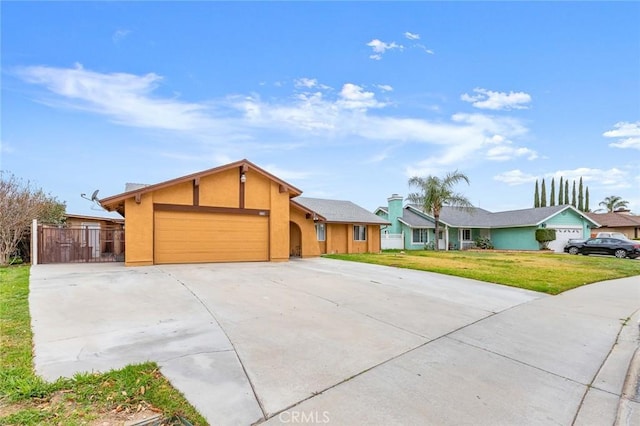 single story home featuring stucco siding, an attached garage, a front yard, fence, and driveway