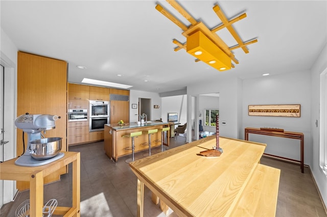 dining room featuring recessed lighting