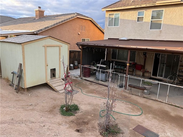 13023 Tehachapi St, Hesperia, CA 92344 - back of property with a shed and a patio area