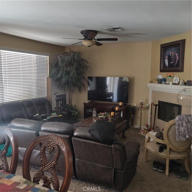 13023 Tehachapi St, Hesperia, CA 92344 - living room with carpet floors and ceiling fan