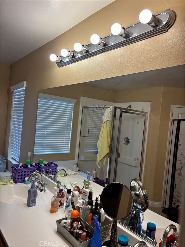 13023 Tehachapi St, Hesperia, CA 92344 - bathroom featuring an enclosed shower and sink