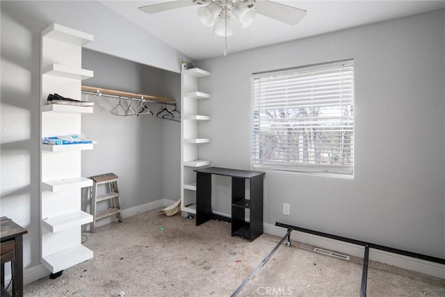 interior space featuring ceiling fan