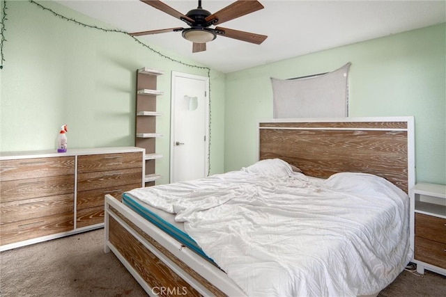 carpeted bedroom with ceiling fan and lofted ceiling