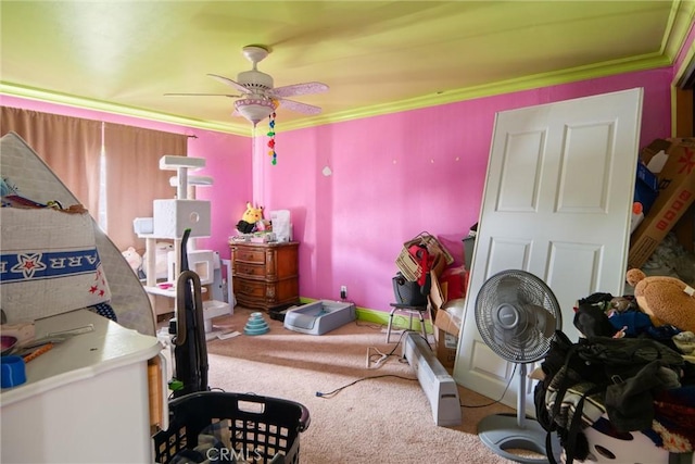 bedroom featuring crown molding, ceiling fan, and carpet