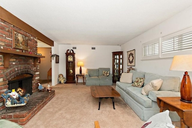 living room featuring a brick fireplace and light carpet