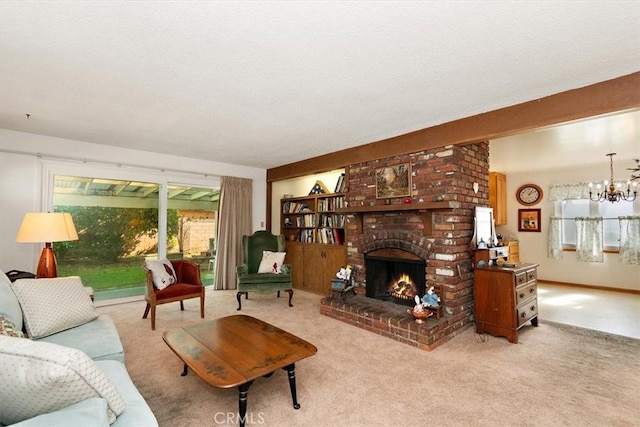 living room featuring a brick fireplace, light colored carpet, and an inviting chandelier