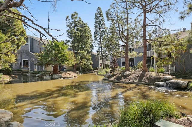 view of property's community featuring a water view