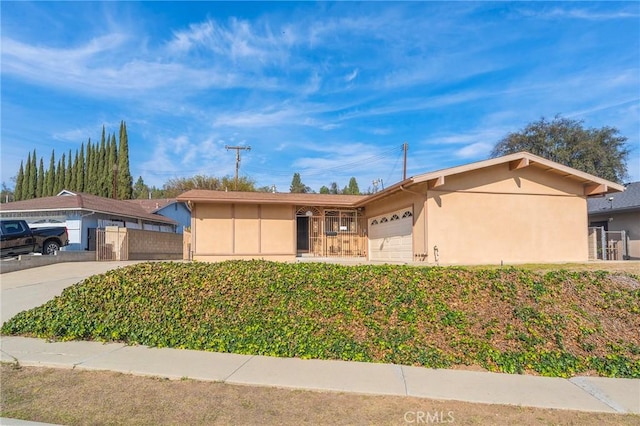 single story home with a garage